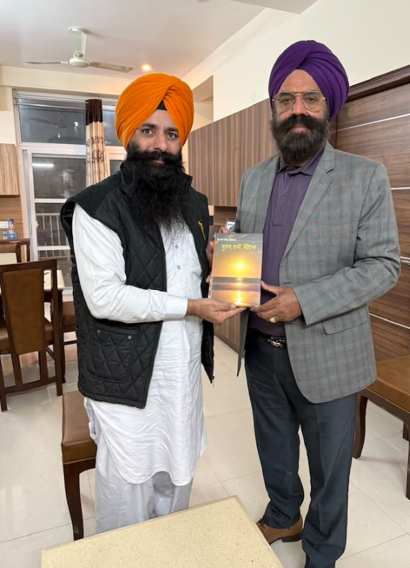 Piara Singh Kudowal presenting his poetry book Samian Ton Paar